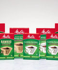 Top Shelf Unbleached Coffee Filters Size Four Fits Eight To Twelve Cup Brewers Deep Flavor Perforations For Bold Morning Kick Compostable And No Sweat Cleanup Pack Of Twelve One Thousand Two Hundred Sheets Solid Brew Gear displayed in various packages.
