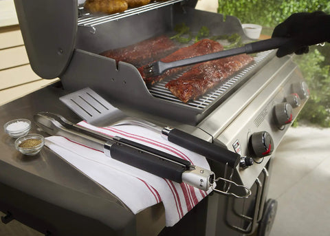 Precision 3 Piece Grilling Tool Set With Stainless Steel Tongs Spatula And Silicone Basting Brush on a grill