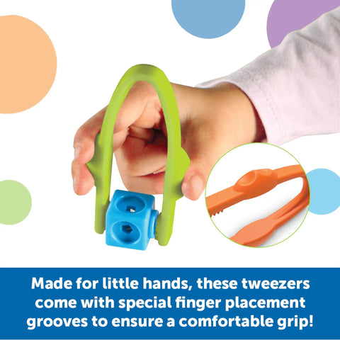 Child holding Easy-Grip Tweezers for Kids, featuring colorful sensory bin tools and comfortable finger placement grooves for toddlers.