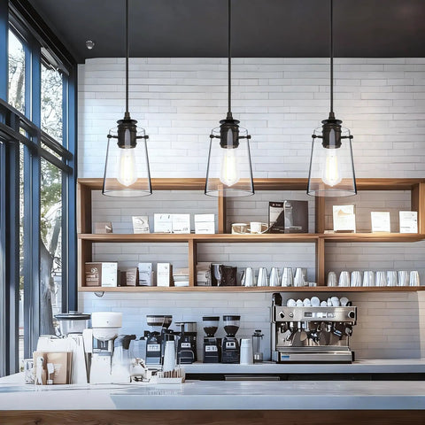 Black Pendant Lights For Kitchen Island, Modern Glass Hanging Fixture in a coffee shop setting with adjustable drop cord.