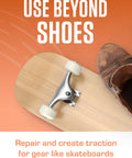 Original Shoe Goo Clear Adhesive For Shoes 3.7 Fl Oz Tube Fast Bond used for repairing a skateboard and brown shoe on orange background