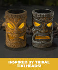 Set Of 2 Solar Tiki Torches With Flickering Flame Effect For Outdoor Patio Decor on display, brown and gray polyresin.