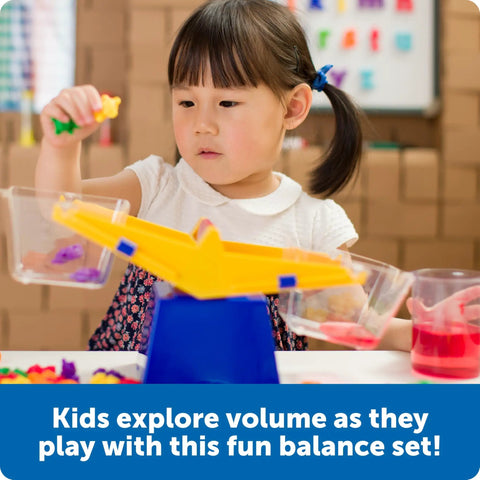 Child using Primary Bucket Balance Teaching Scale For Kids Hands On STEM Learning Tool With Removable Buckets in classroom.