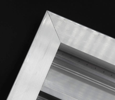 Close-up of an Aluminum Exterior Gable Louver Vent For Walls And Crawlspace, Weatherproof Air Grille With Screen Mesh, corner detail.