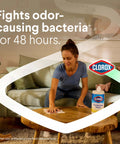 Person cleaning table with Disinfecting Cleaning Wipes With Sparkling Lemon Scent Antibacterial And Bleach Free Safe On 100 Plus Surfaces 75 Count