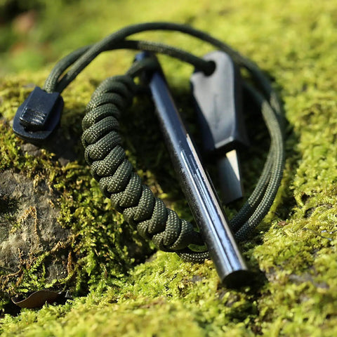 Survival Ferro Rod Fire Starter Kit with Drilled Ferrocerium Rod, 4 Inch Long, 0.375 Inch Diameter, Paracord Lanyard, on moss