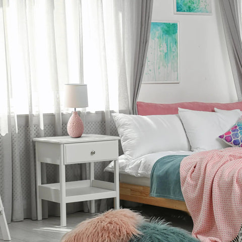 Bedroom scene featuring Blue Textured Stucco Ceramic Oval Table Lamp With White Fabric Shade For Living Room Bedroom Or Office, 14.17 Inch Tall, 7.25 Inch Shade Diameter, Bulb Not Included, Uses One 60W Equivalent Medium Base Bulb on white nightstand.