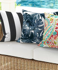 Two Pack Waterproof Outdoor Throw Pillows With Inserts 18x18 Square Cushions For Patio Deck Garden Or Home Furniture Cabana Black All Weather Decor For Sofa Bench And Lounge, shown on a wicker sofa.
