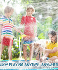 Children and dog playing on 10 Ft Extra Large Non Slip Splash Pad For Kids Adults And Dogs Blue Backyard Water Play Mat