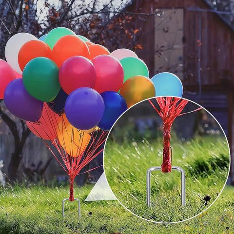 Colorful balloons anchored with 6 Inch Landscape Staples 50 Pack Galvanized Garden Stakes For Lawn Sod Weed Barrier Fabric