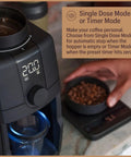 Pro Tier Stepless Grind Adjustment Coffee Grinder Featuring Precision Steel Burrs And Quick Release Design For Smooth Shot Pulling Or Effortless Daily Brewing In Slick Black Finish with digital display and coffee beans.