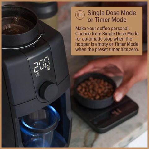 Pro Tier Stepless Grind Adjustment Coffee Grinder Featuring Precision Steel Burrs And Quick Release Design For Smooth Shot Pulling Or Effortless Daily Brewing In Slick Black Finish with digital display and coffee beans.