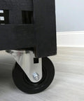 Four Inch Soft Rubber Swivel Stem Caster With Half Inch Stem Diameter And Two Hundred Pound Load Capacity Ideal For Furniture Carts And Equipment Black Finish Delivers Smooth Quiet Mobility On Hard Surfaces installed on wooden cart