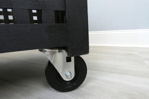 Four Inch Soft Rubber Swivel Stem Caster With Half Inch Stem Diameter And Two Hundred Pound Load Capacity Ideal For Furniture Carts And Equipment Black Finish Delivers Smooth Quiet Mobility On Hard Surfaces installed on wooden cart