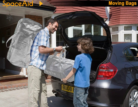 Man and child loading Heavy Duty Moving Bags Set With Extra Large Storage Totes And Backpack Straps Strong Handles 86L Capacity