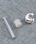 Beefy 24 Piece Cam Lock Nut Set For Cabinet And Furniture Assembly with nylon and iron parts on fabric surface