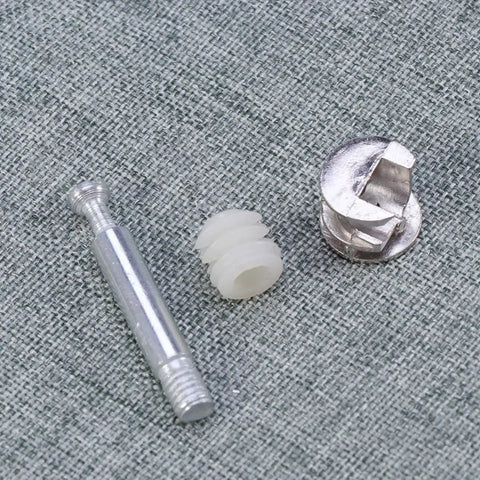 Beefy 24 Piece Cam Lock Nut Set For Cabinet And Furniture Assembly with nylon and iron parts on fabric surface