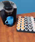 Ultra Slim Keurig K Cup Pod Organizer Tray For Kitchen And Office No Mess Waterproof And Washable Drawer Insert That Holds 36 Pods 12.5 By 12.5 Inches Made In USA next to coffee maker