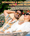 Two people relaxing on a 12 Ft Double Rope Hammock With 13 Ft Brown Wooden Arc Stand For Outdoor Patio And Poolside Chill Session, 2 Person Hand Woven Cotton Hammock With Spreader Bar, Natural Color, 450 Lbs Capacity.
