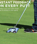 Golfer using Classic Golf Putting Mirror For Alignment And Consistency Training On The Go Portable 12 By 6 Inch Practice Mirror with tees on grass