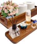 Premium Acacia Wood Toilet Tank Caddy And Vanity Tray Duo Ideal For Bathroom Clutter Control with flowers and toiletries on display.