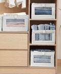 4 Pack Linen Storage Bins With See Through Window For Closet Organization And Home Organization, with folded clothes visible