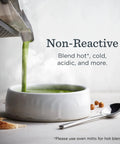 Pouring soup from 48-Ounce Stainless Steel Blender Container With Self-Detect, Dishwasher Safe, BPA-Free Clear Lid into bowl