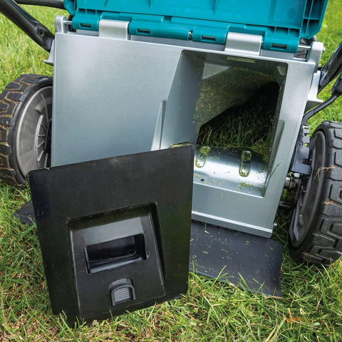 Pro Grade 21 Inch Cordless Self Propelled Lawn Mower with visible grass catcher compartment and black cover on grass.