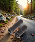 Dual Length Black Bike Handlebar Grips For Twisting Shifters, Shock Absorbent Anti Slip Rubber Grips on a forest path