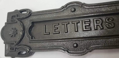 Neo Classical Cast Iron Mailbox With Swinging Letter Slot Door Wall Mounted Vintage Antique Postal Box Old School Charm, Ornate Garlands And Floral Accents, Reproduction Of 1900 Original With Weathered Iron Finish, close-up of letter slot detail