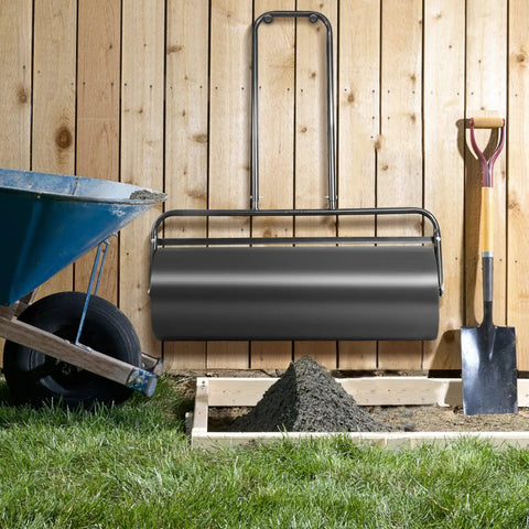 Beefy 36 Inch Lawn Roller With 17 Gallon Capacity For Water Or Sand Filling beside shovel and wheelbarrow on grass