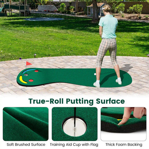 Person practicing on Par 3 Putting Green Mat 10 Foot By 3 Foot With 3 Cups Flag And Hole Covers in backyard