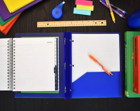 Two Pocket Poly Folder Set With Three Hole Punch Prong Fasteners For Letter Size Papers Assorted Colors Three Per Pack on desk
