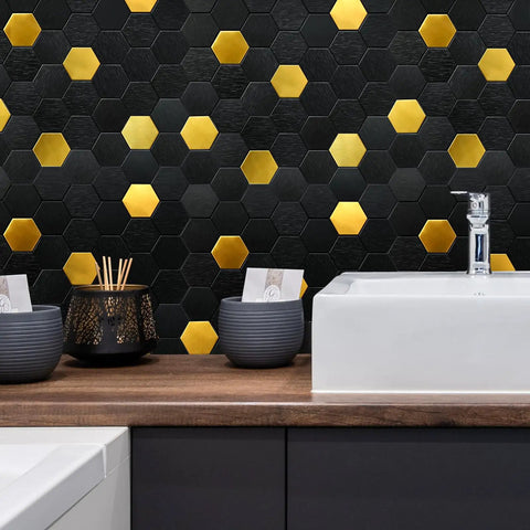 Peel And Stick Backsplash Honeycomb Tile Set For Walls Kitchen Bathroom And Fireplace Stainless Steel Look Gold Brushed Black Finish 5 Sheets Easy Cut And Install shown behind a sink and decor items.