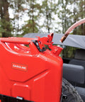 One Half Inch X Eight Foot Self Priming Jiggler Siphon Hose Transfers Gas Water Oil Fast Up To Four Gallons Per Minute No Sweat Quick Transfer Tube attached to red gasoline can.
