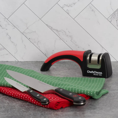 Pronto Hone 15 Degree Knife Sharpener Two Stage For Straight Edge And Serrated Knives on kitchen counter with knives and towels