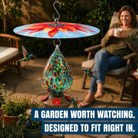 Top Shelf Bird Feeder Baffle And Rain Guard Dome Cover, Ironclad Weatherproof Shield To Keep Squirrels Out And Seed Dry, No Hassle Steel Mount Kit In Bold Red Floral Design with hummingbirds feeding.