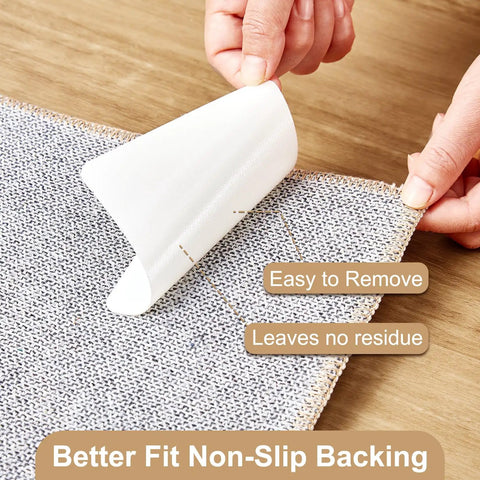 Person applying Anti Slip Rug Grips 12 Pack For Hardwood Floors And Wood Area Rugs White Rubber Backing Rug Tape to corner of rug.