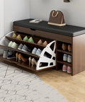 Heavy Duty Flip Top Shoe Cabinet With Faux Leather Seat And Hidden Storage Compartment, wooden organizer holding various shoes.