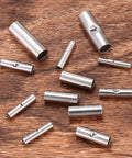 120 Pcs Non Insulated Butt Connectors For 22 To 16 Gauge Wire, Uninsulated Butt Splice Connectors, Copper Tin Plated on wood surface