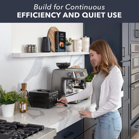 Woman using Beefy Step Up And Down Voltage Converter For Home And Travel Handles Up To 3000 Watts Across Several Devices Converts 110 Or 120 Volts To 220 Or 240 Volts And Back Universal Output With European Power Adapter Included on kitchen counter