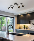 Slick Broadway 30 Inch Modern Industrial 4 Light Fixed Track Lighting Kit With Adjustable Spotlight Heads in kitchen setting