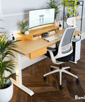Top Tier Dual Motor Electric Height Adjustable Standing Desk With A Roomy 80 Inch Wide Bamboo Top And Sleek Matte Black Frame, modern office setup.