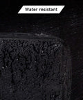 Close-up of water-resistant black fabric on Travel Toiletry Organizer Dopp Kit For Men Large Water Resistant Shaving Bag