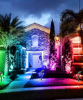 Super Bright Solar Spotlight With 36 LEDs, RGB Color Changing Outdoor Landscape Lights illuminating house at night, IP65 waterproof