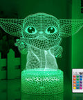 Baby Yoda 3D Night Light LED Lamp With Remote And Smart Touch Control, glowing green on acrylic base, shown with remote control.