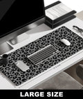 Extended Gaming Desk Mat XXL Full Coverage Mouse Pad For Huge Desks Black Leopard Print on workspace with keyboard and mouse