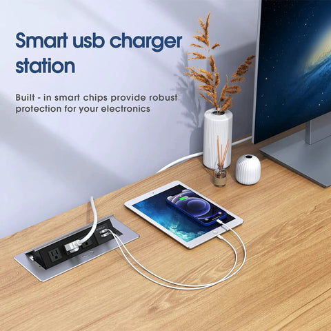 Desktop Pop Up Outlet With 2 USB Ports And 3 Outlets, Silver Finish on wooden desk with tablet charging