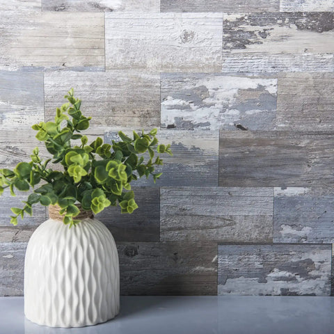 Decorative plant in front of Peel And Stick Tile Backsplash Kit 102 Piece 3 By 6 Inch Distressed Wood Subway Planks Waterproof Heat Resistant