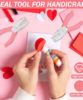 Crafting scene with Star And Heart Hole Punch Set 1/4 Inch handheld paper punch with soft grip pink handles for tags, scrapbooking.
